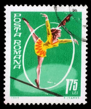 Stamp printed in Romania shows Tightrope walking, Circus series, circa 1969.