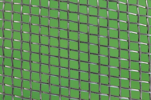 beautiful macro photo of an abstract metal kitchen strainer background