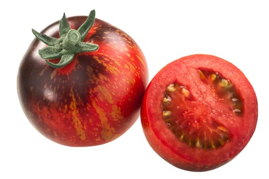 Blue fire heirloom tomatoes, ripe, anthocyan-rich,whole and a half, isolated
