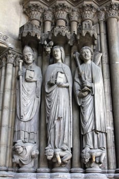 Medieval gothic statues on entry to Eglise St. Germain l'Auxerrois in Paris, France.