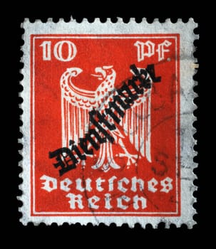Stamp printed in the German Empire shows coat of arms of Germany, circa 1924