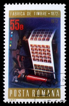 Stamp printed in Romania shows Multicolor printing press, Stamps Factory Centenary, circa 1972.