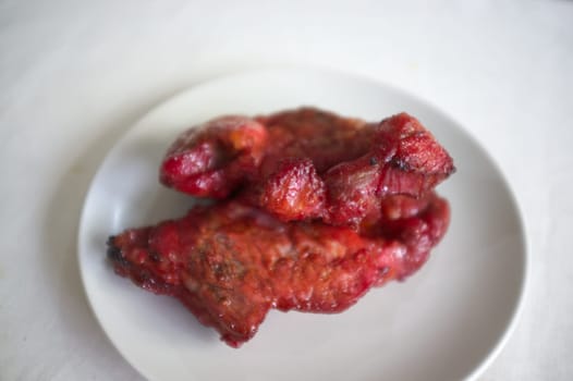 Roasted red pork on dish , THAI cuisine  , Chinese food