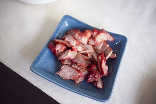 Roasted red pork on dish , THAI cuisine  , Chinese food