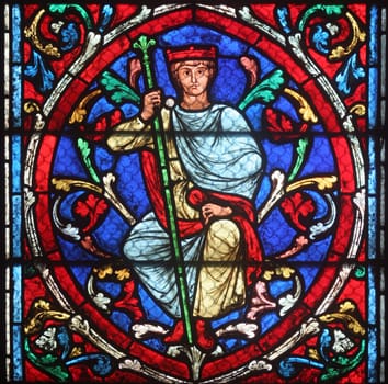 Colorful stained glass window in Cathedral Notre Dame de Paris