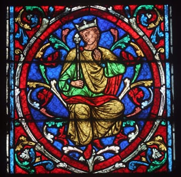 Colorful stained glass window in Cathedral Notre Dame de Paris
