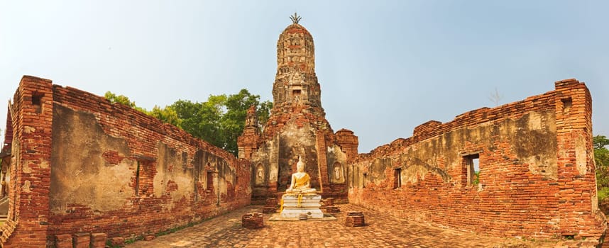 Buddha statue in Wat Cherng Tha. Ayutthaya historical park. Panorama
