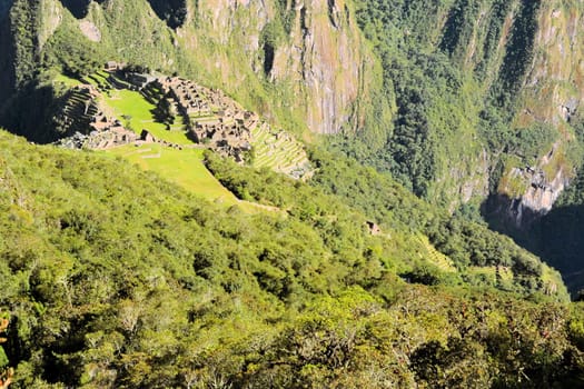 Machu Picchu is the famous lost city of the Incas near the river Urubamba located in the region of the sacred valley of Cuzco. Machu Picchu is a UNESCO world heritage site and one of the 7 new world wonders.