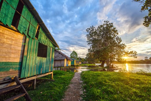 Sunset over the village of Santa Rita in the Amazon rainforest in Peru