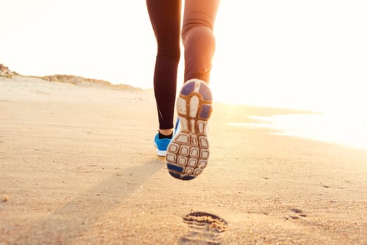 Runner woman tying the shoelaces