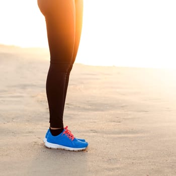 Runner woman tying the shoelaces