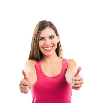 Beautiful brunette woman laughing and pointing to the side, isolated over white background