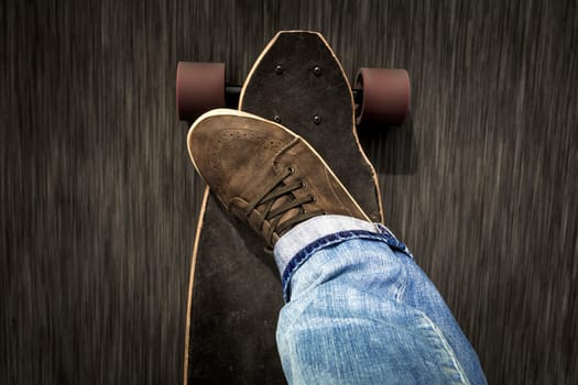 Detail of a young man feet riding a skateboard