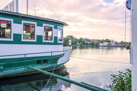 Houseboat firmly moored,is used as a restaurant.