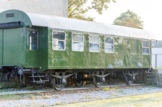 Railway wagons for passenger transport on a siding.