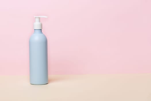 Coronavirus prevention sanitizer gel for hands hygiene, corona virus(covid-19) protection. Antiseptic, Hygiene and Health concept. Minimalist style on pink background