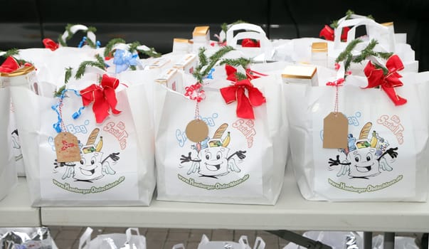 Yasmina Filali, german actress and model , Max Bryon and Crew distributed Christmas bags from Hamburger Homeless Aid e.V. to the homeless and needy at Hamburg Central Station