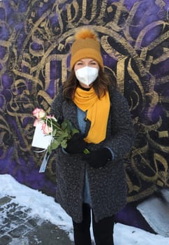 Janine Marscha , .WorldMission Rethink  Distribution of 111 roses .for Valentine's Day at the vigil for the Kiez at Spielbudenplatz Hamburg , 14.02.2021