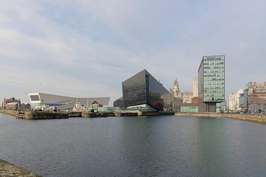 Liverpool, United Kingdom, 2nd February, 2020: Museum of liverpool, Liver building and Regus offices shown from over the canning dock on a sunny day
