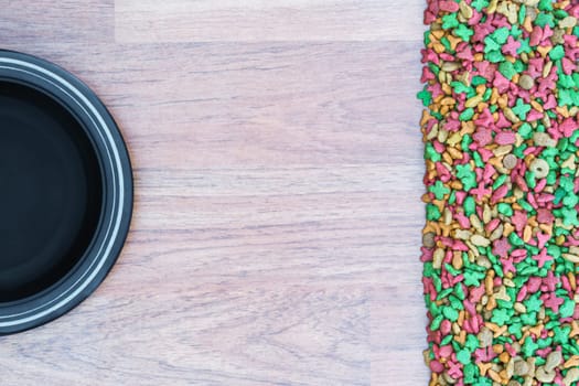 Top view dry food for cat and dog with empty bowl