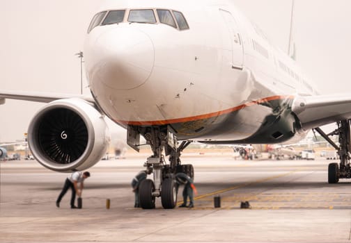 Airplane near the terminal in an airport cockpit