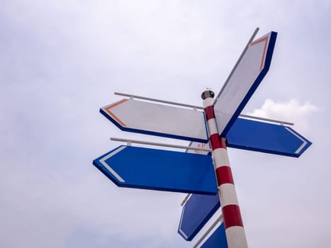 High Blank directional road signs over blue sky