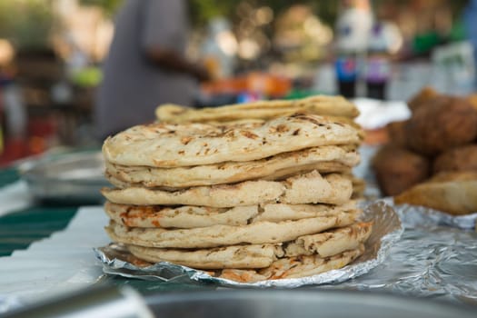 Chapati-unleavened tortillas, a popular market food .Zanzibar, Africa