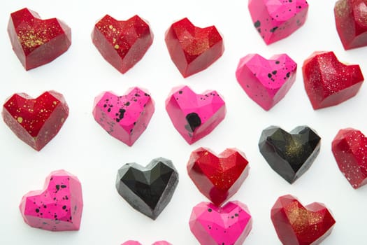 Delicious chocolate candies, close up, different colors.