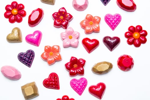 Delicious chocolate candies, close up, different colors.