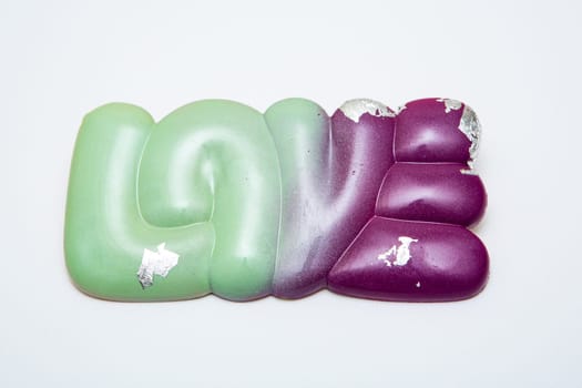 Delicious chocolate candies, close up, different colors.