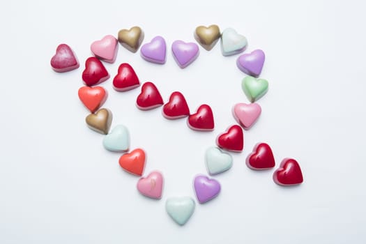 Delicious chocolate candies, close up, different colors.