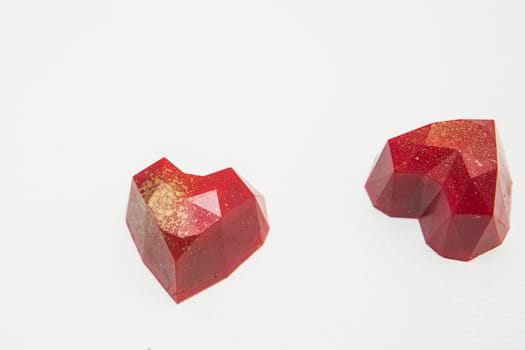 Delicious chocolate candies, close up, different colors.