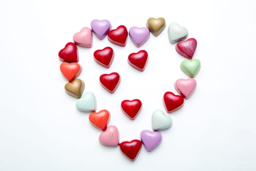 Delicious chocolate candies, close up, different colors.
