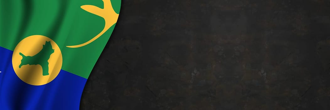 Christmas Island flag on concrete wall. Banner with fabric texture of the flag of Christmas Island.