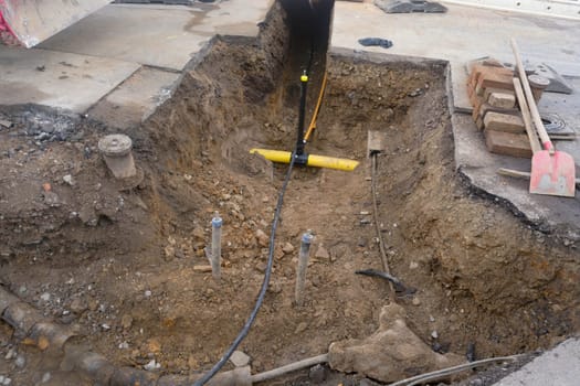 Supply lines in the ditch for the energy supply of a multiple dwelling