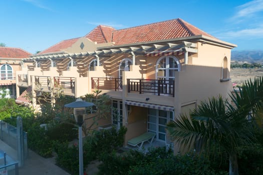 View of holiday apartment complex with swimming pool in Meloneras, Gran Canaria in Spain.
