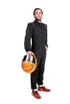 Racing driver posing with helmet isolated in white