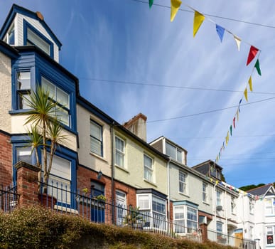 view of old terrace houses in the village on southern coast of Cornwall.