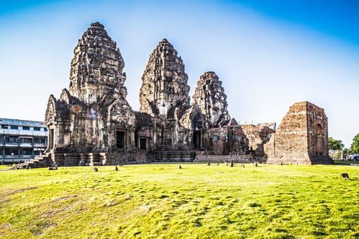 Phra Prang Sam Yod  historical tourist spot in old town . Monkeys lives with ruins in Lopburi, Thailand. Religious buildings constructed by the ancient Khmer art. Asia destination of tourist