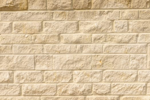 detail of wall built with blocks of white Portland stone.