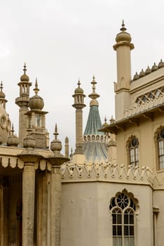 detail of highly decorated building in center of touristic sea town, shot from the public street,  Brighton, East Sussex.