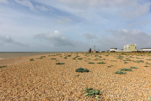 view of the buildings of nuclear plant on the shingle beach at Dungedness,  Romney Marsh, Kent.