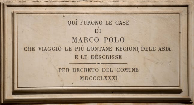 The memorial plaque on the house where he lived Marco Polo
