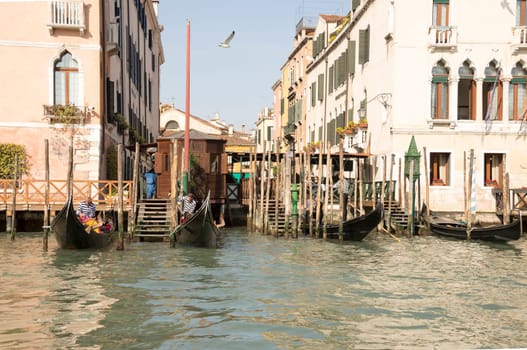 VENICE,ITALY-MARCH 30- Gondoliers in the parking lot waiting for passengers in March 30, 2014  in Venice