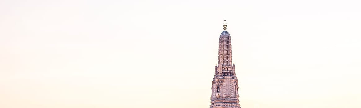 Sunset silhouette scene at Wat Arun Temple. The best place to watch sunset in Bangkok . Wat Arun Temple of the Dawn at sunset on banks of Chao Phraya River Bangkok Thailand Southeast Asia Asia