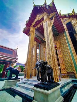 Entrance with elephant statue ancient architecture landmark in Bangkok Thailand. Traditional temple named Wat Ratchabophit