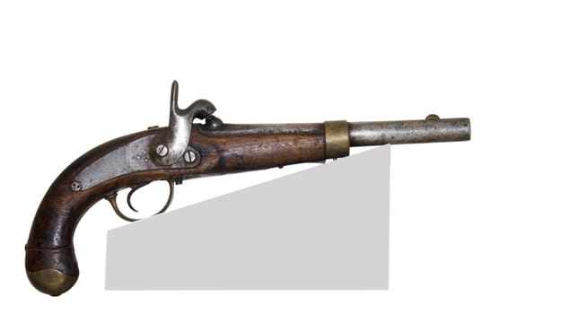 Ancient pistol-is isolated on the white
