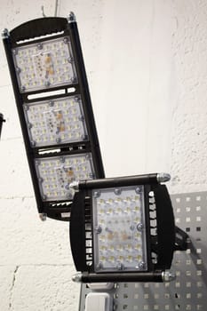 LED flood light, spot light on the top, exposition of industrial or street projectors close up