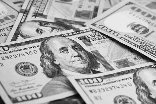 A hundred American banknotes are scattered. cash hundred-dollar bills, dollar background image.