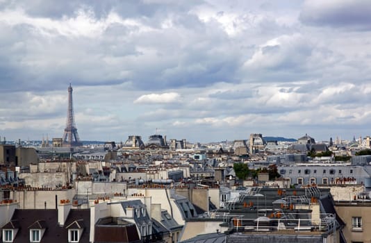 At the level of the roofs of Paris. The Eiffel Tower in the distance (Paris France)
